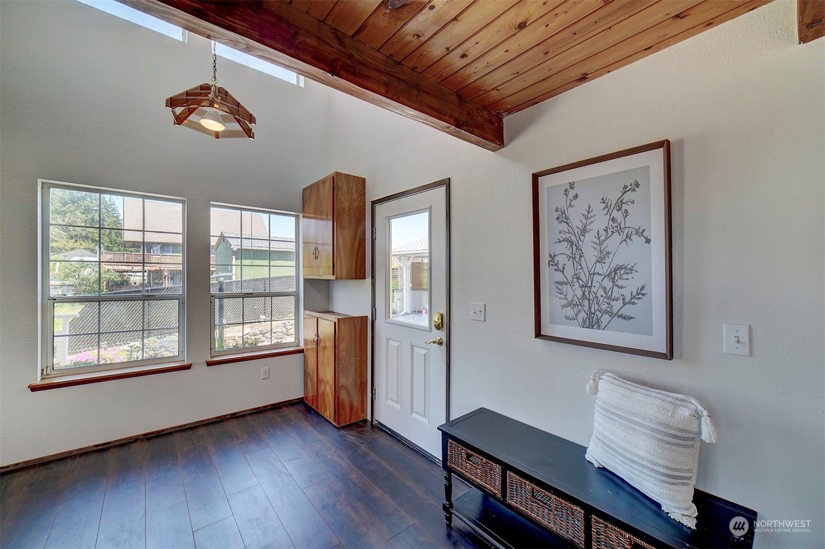 220 East Olympic Drive Grapeview, WA 98546 - Photo 8 of 40 a living room with furniture and a window