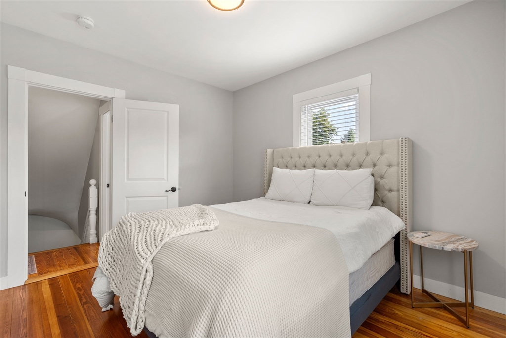 26 Clark Street Danvers, MA 01923 - Photo 27 of 42 a bedroom with a bed and a window