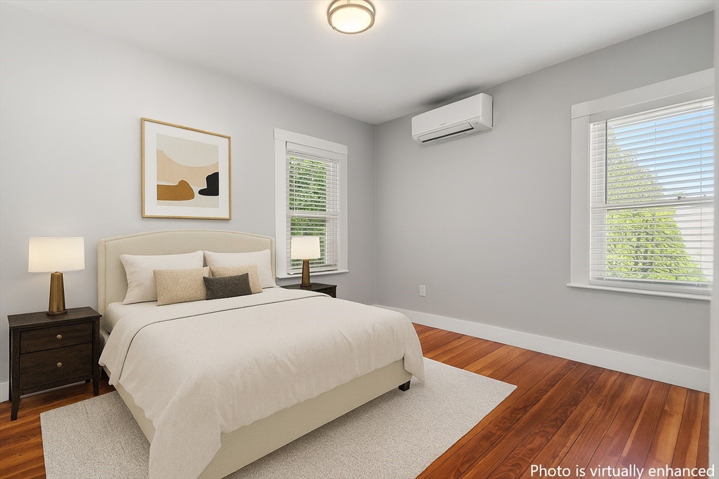 26 Clark Street Danvers, MA 01923 - Photo 28 of 42 a bedroom with a bed and a window