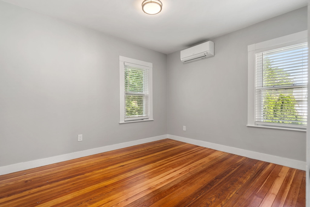 26 Clark Street Danvers, MA 01923 - Photo 29 of 42 a view of a room with wooden floor and windows