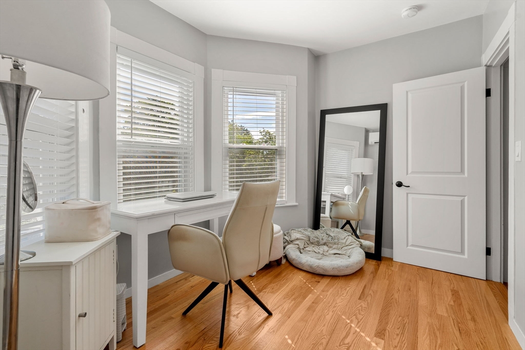 26 Clark Street Danvers, MA 01923 - Photo 32 of 42 a view of a bedroom with furniture and windows