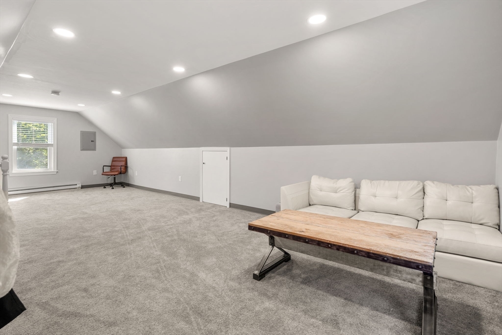 26 Clark Street Danvers, MA 01923 - Photo 33 of 42 a living room with furniture and a window