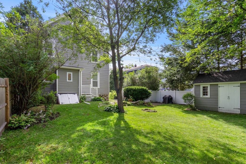 26 Clark Street Danvers, MA 01923 - Photo 35 of 42 a view of a house with backyard and sitting area