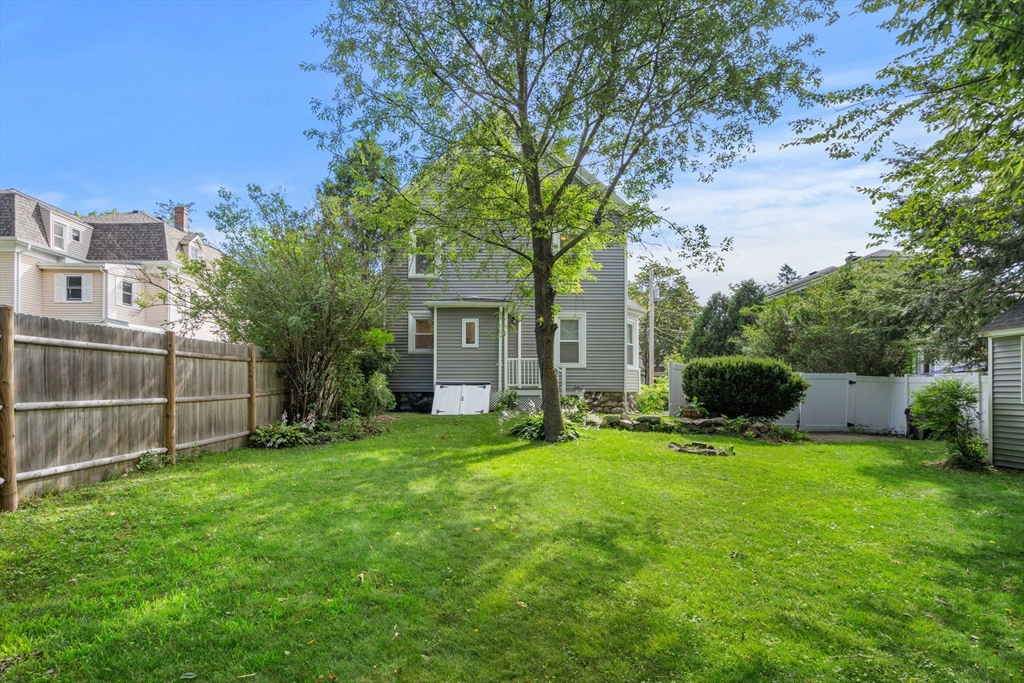 26 Clark Street Danvers, MA 01923 - Photo 36 of 42 a view of a backyard with a sitting area