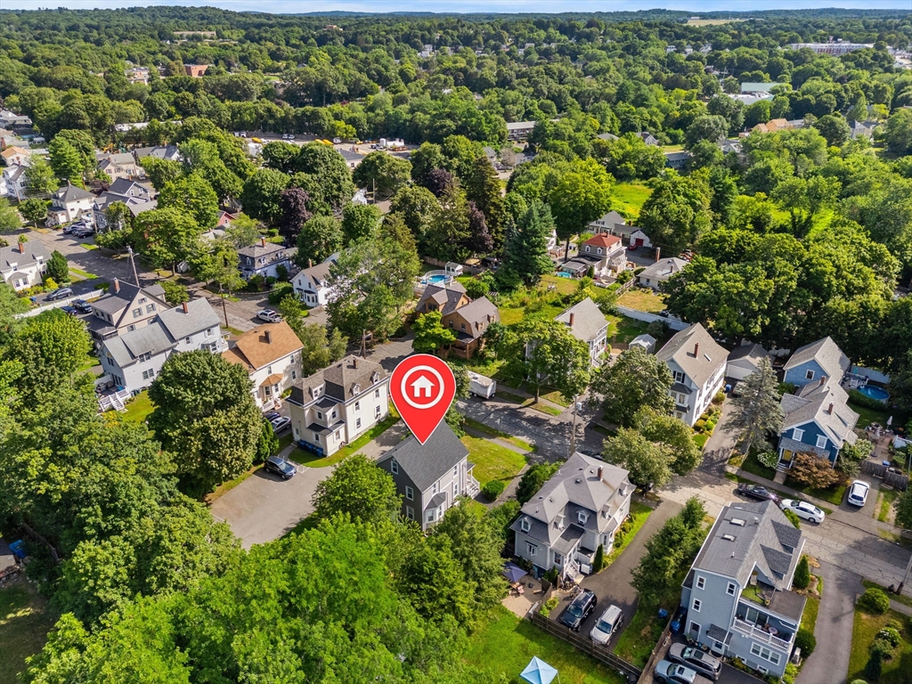 26 Clark Street Danvers, MA 01923 - Photo 39 of 42 an aerial view of a red and white house