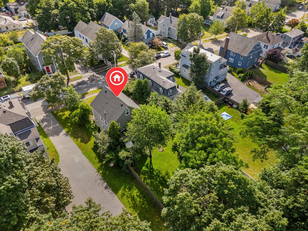 26 Clark Street Danvers, MA 01923 - Photo 41 of 42 an aerial view of residential house with outdoor space and sign board
