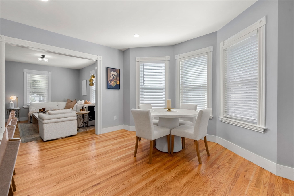 26 Clark Street Danvers, MA 01923 - Photo 7 of 42 a view of a dining room with furniture window and wooden floor