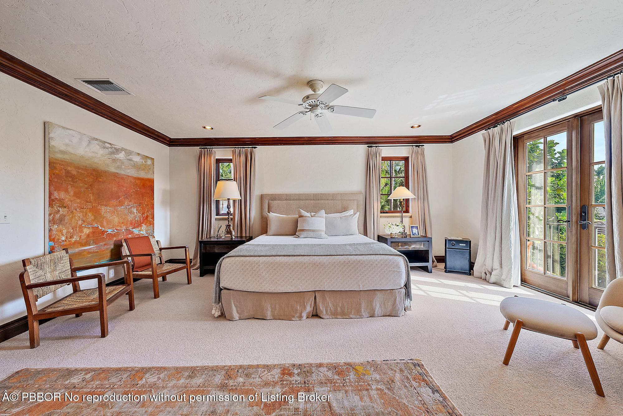 234 Ridgeview Drive Palm Beach, FL 33480 - Photo 14 of 20 a bedroom with a bed and large window
