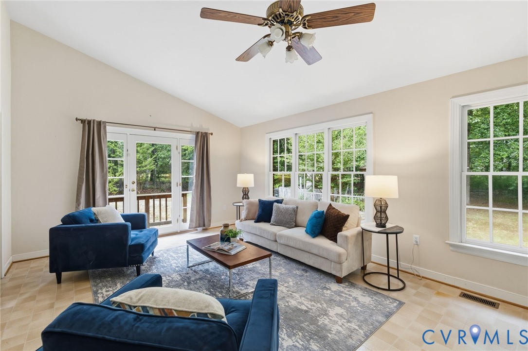 2615 Salisbury Road Midlothian, VA 23113 - Photo 16 of 36 a living room with furniture and a large window