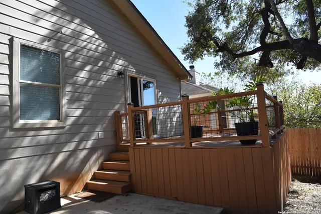 a view of a backyard with sitting area