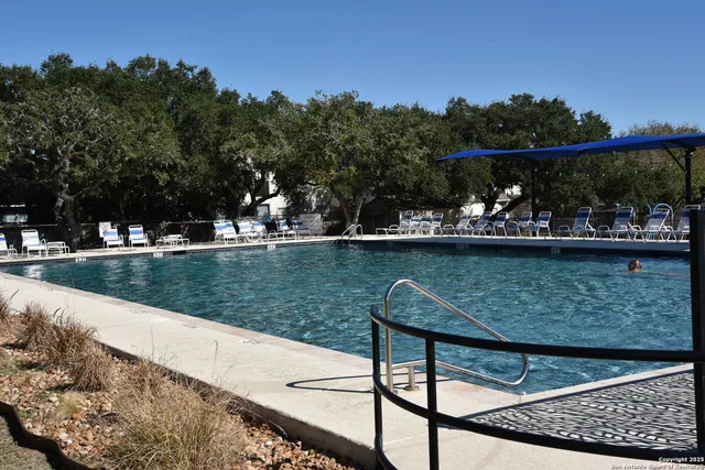 a view of street with sitting area