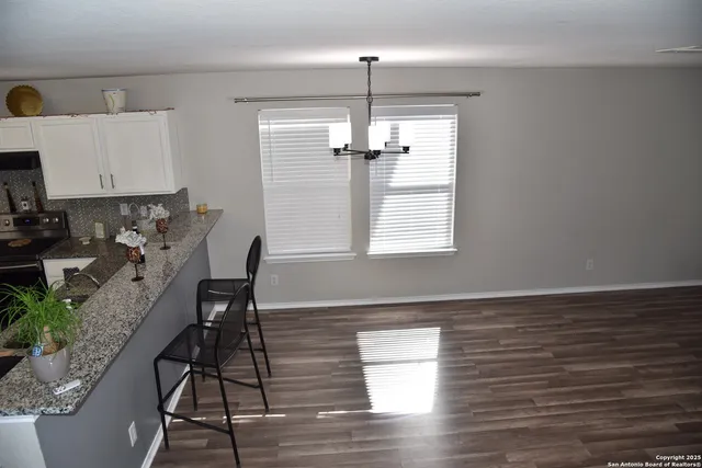 a room with furniture and window