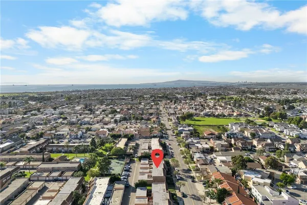 an aerial view of city and lake