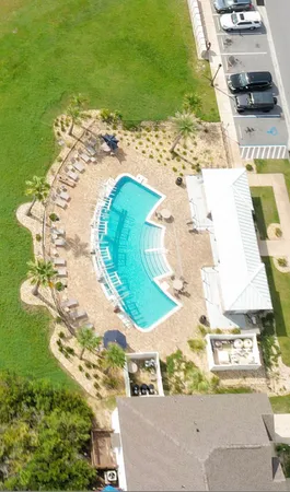 a view of swimming pool with a yard
