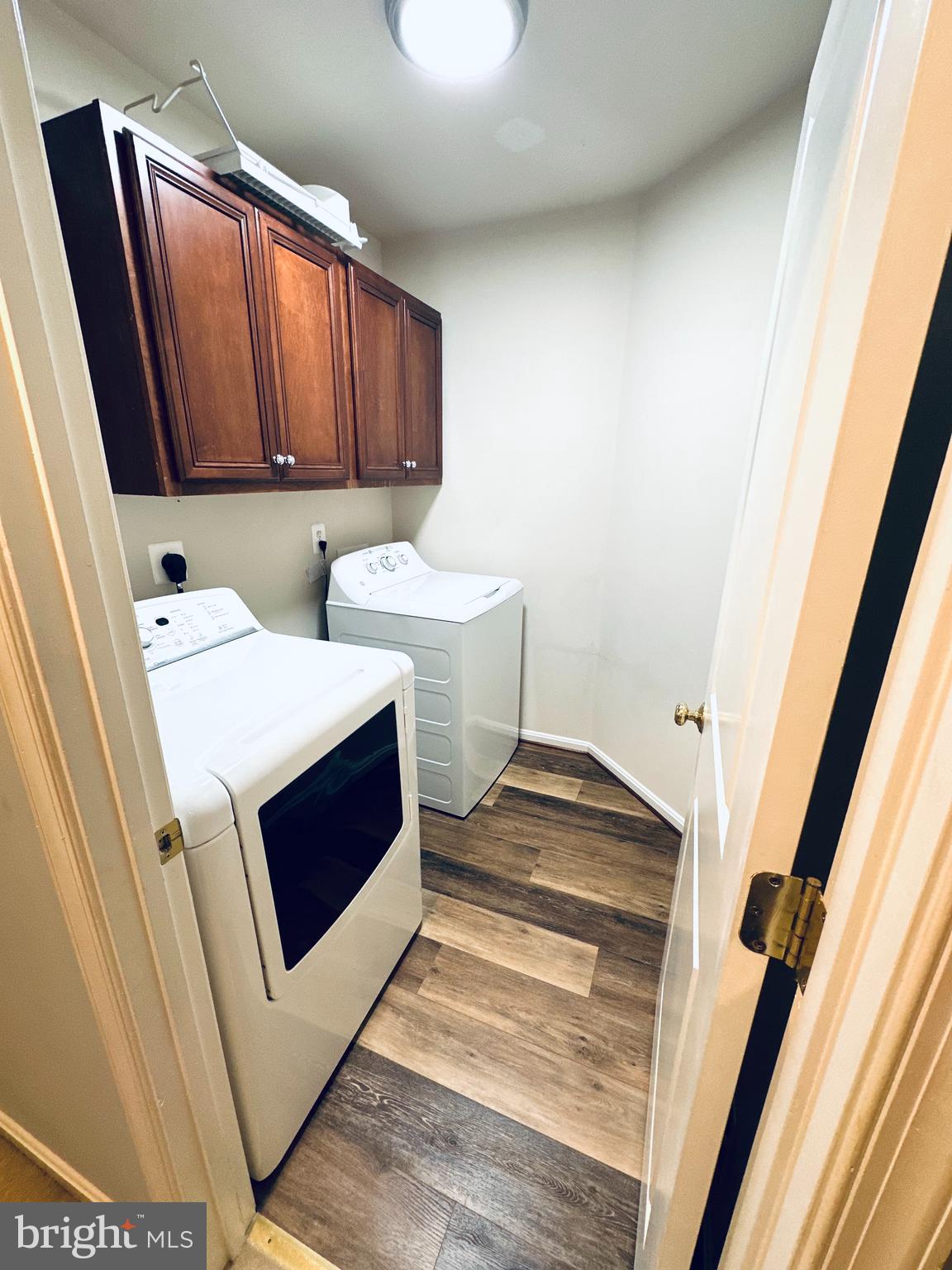 9032 Ribbon Falls Loop Bristow, VA 20136 - Photo 18 of 31 a utility room with dryer and washer