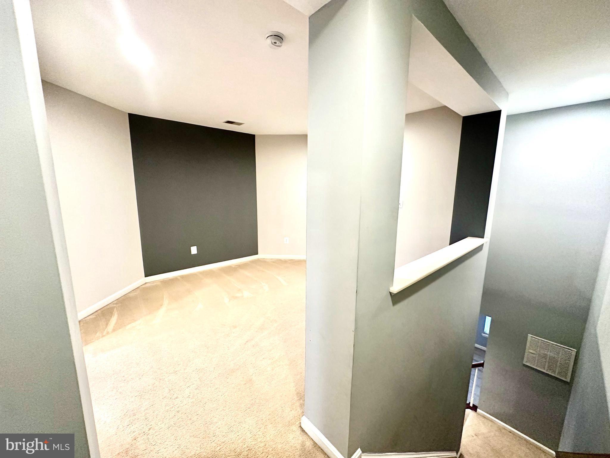 9032 Ribbon Falls Loop Bristow, VA 20136 - Photo 20 of 31 a view of a hallway