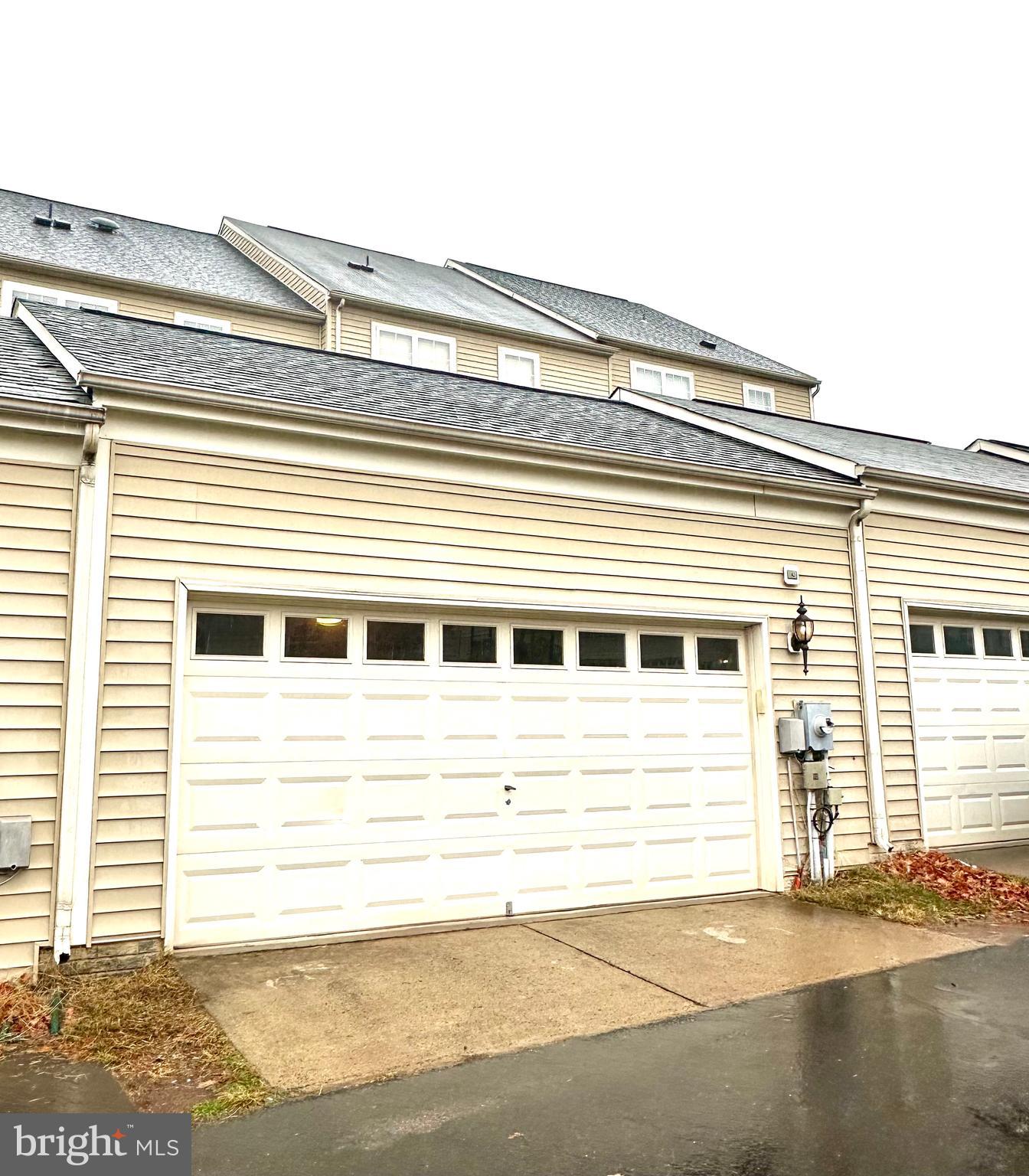 9032 Ribbon Falls Loop Bristow, VA 20136 - Photo 28 of 31 a view of a house with a street