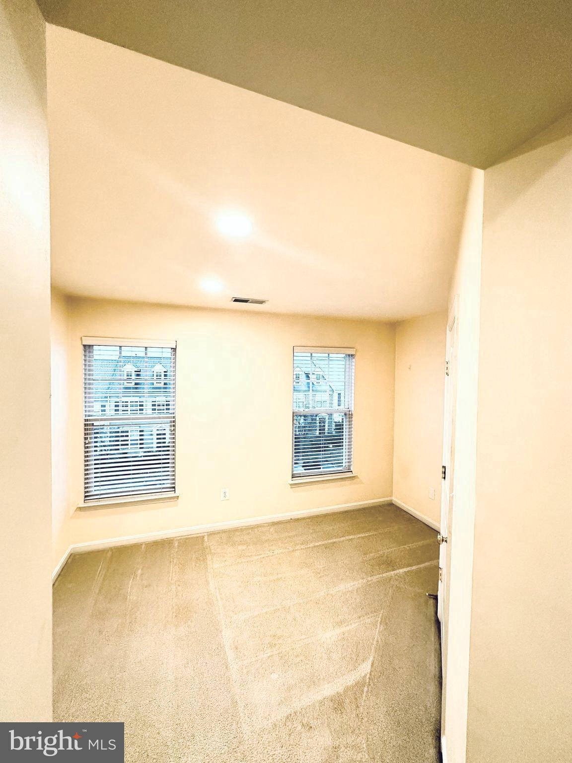 9032 Ribbon Falls Loop Bristow, VA 20136 - Photo 30 of 31 a view of an empty room