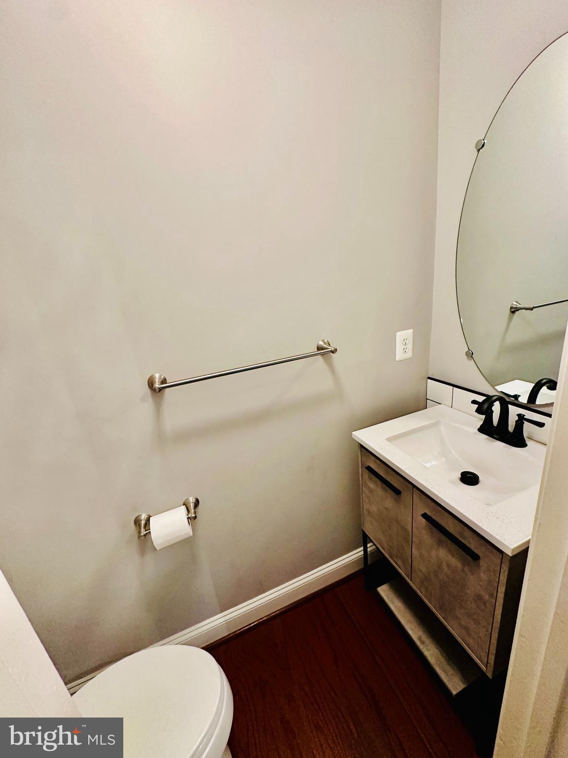 9032 Ribbon Falls Loop Bristow, VA 20136 - Photo 6 of 31 a bathroom with a sink a toilet and a mirror