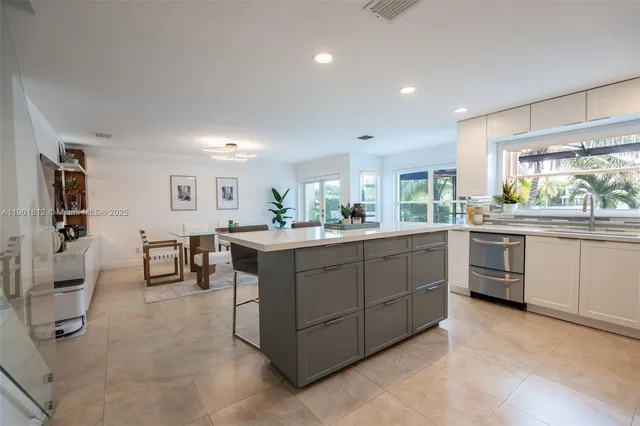 a kitchen with counter top space and appliances