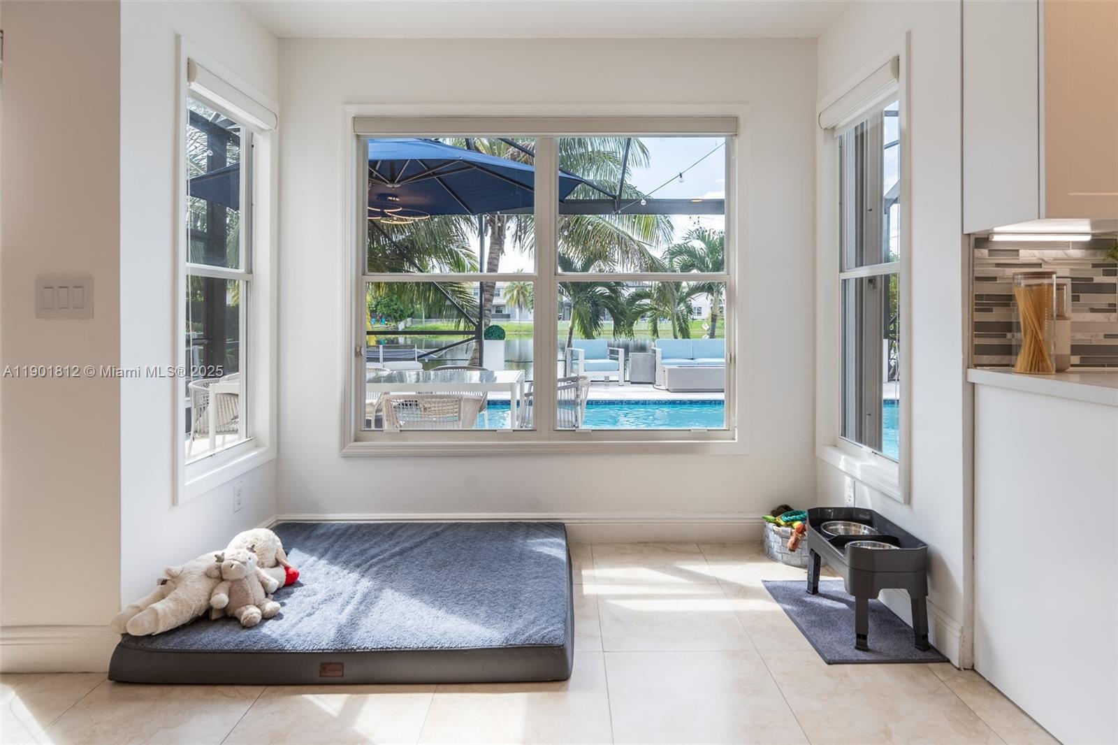 18004 Southwest 20th Street Miramar, FL 33029 - Photo 25 of 49 a living room with furniture and a window