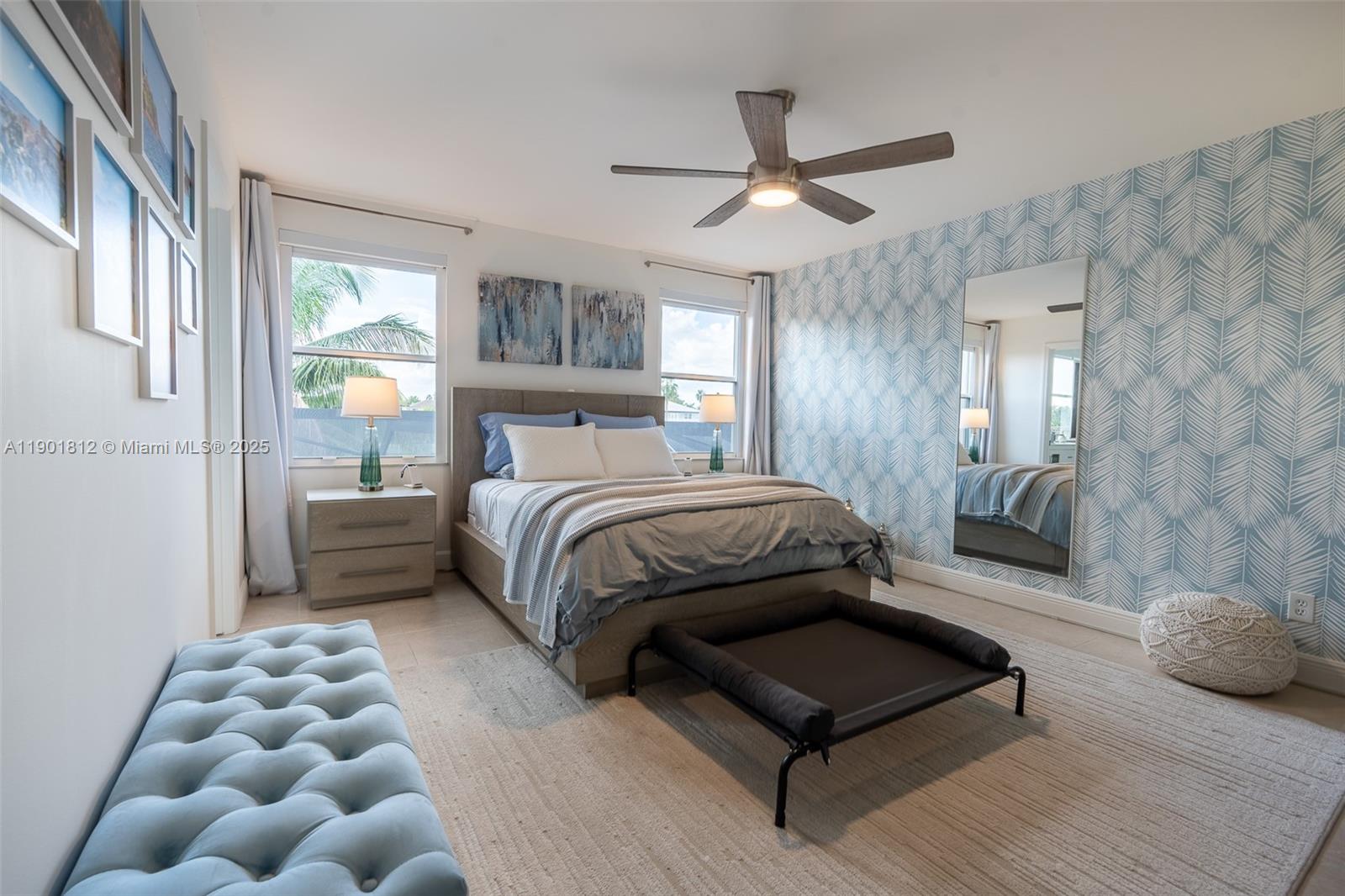 18004 Southwest 20th Street Miramar, FL 33029 - Photo 37 of 49 a bedroom with a bed mirror and window