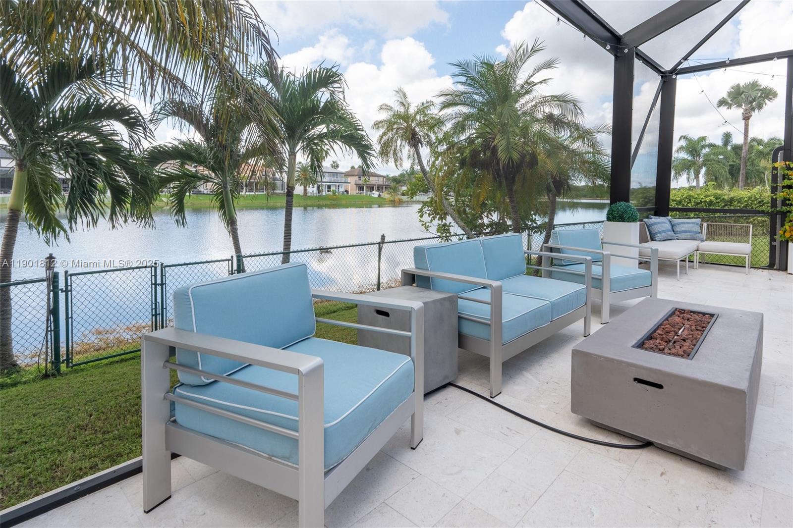 18004 Southwest 20th Street Miramar, FL 33029 - Photo 45 of 49 a view of a patio with couches and a fire pit