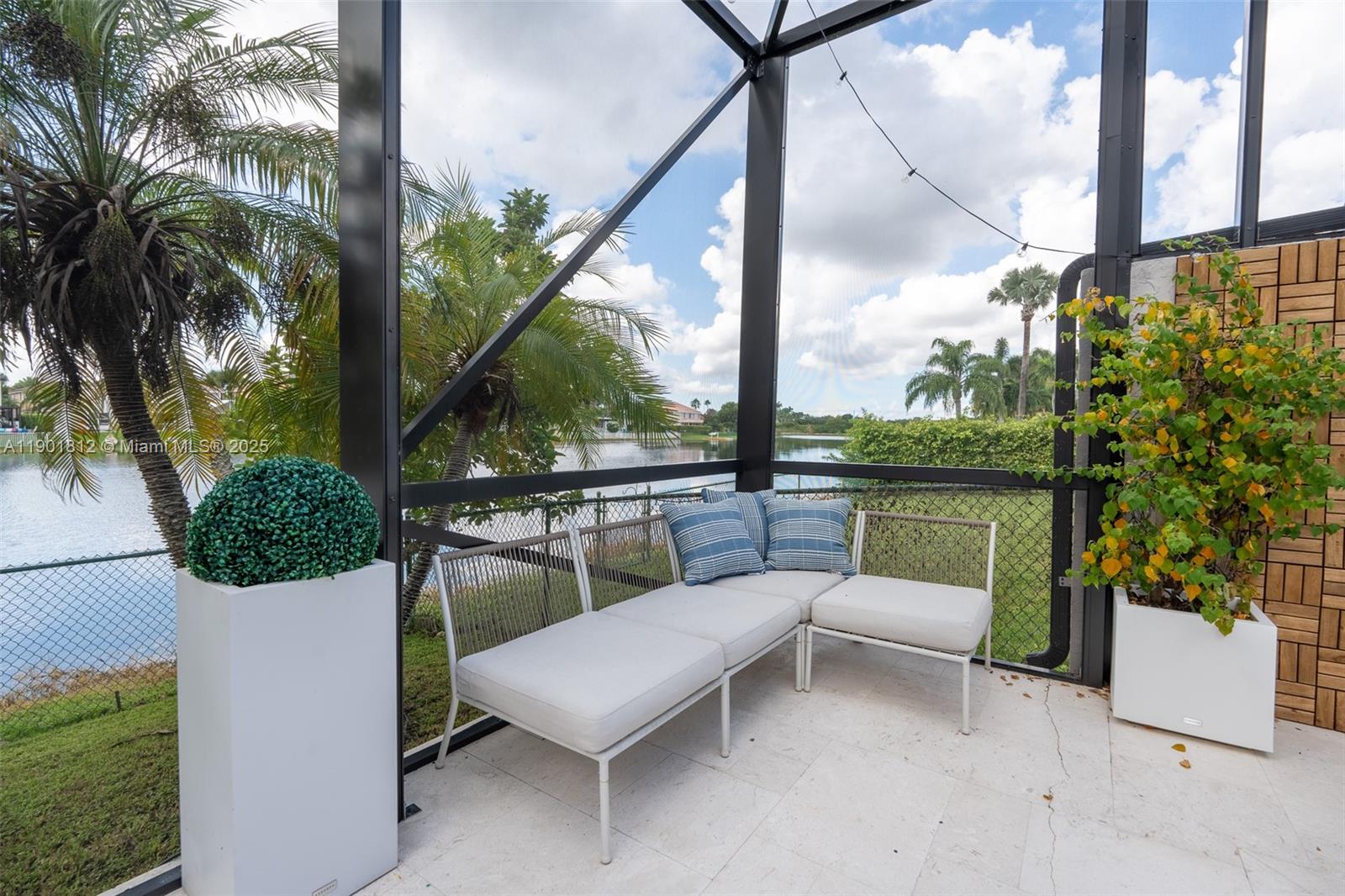 18004 Southwest 20th Street Miramar, FL 33029 - Photo 46 of 49 a view of a chairs and table in the patio