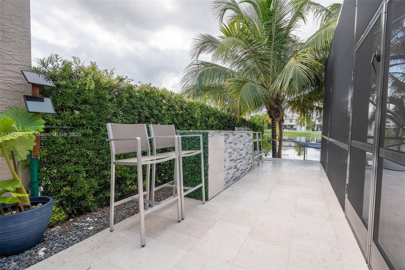 18004 Southwest 20th Street Miramar, FL 33029 - Photo 48 of 49 a view of a house with a backyard