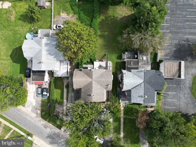 an aerial view of a city with lots of residential buildings