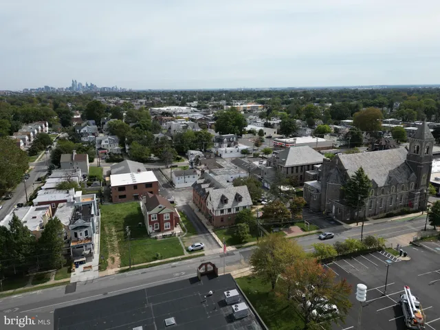 a kitchen with stainless steel appliances granite countertop a refrigerator stove a sink and dishwasher
