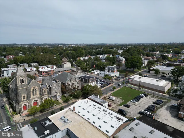 a kitchen with stainless steel appliances granite countertop a stove and a microwave