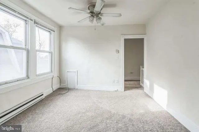 a bathroom with a bathtub sink and toilet