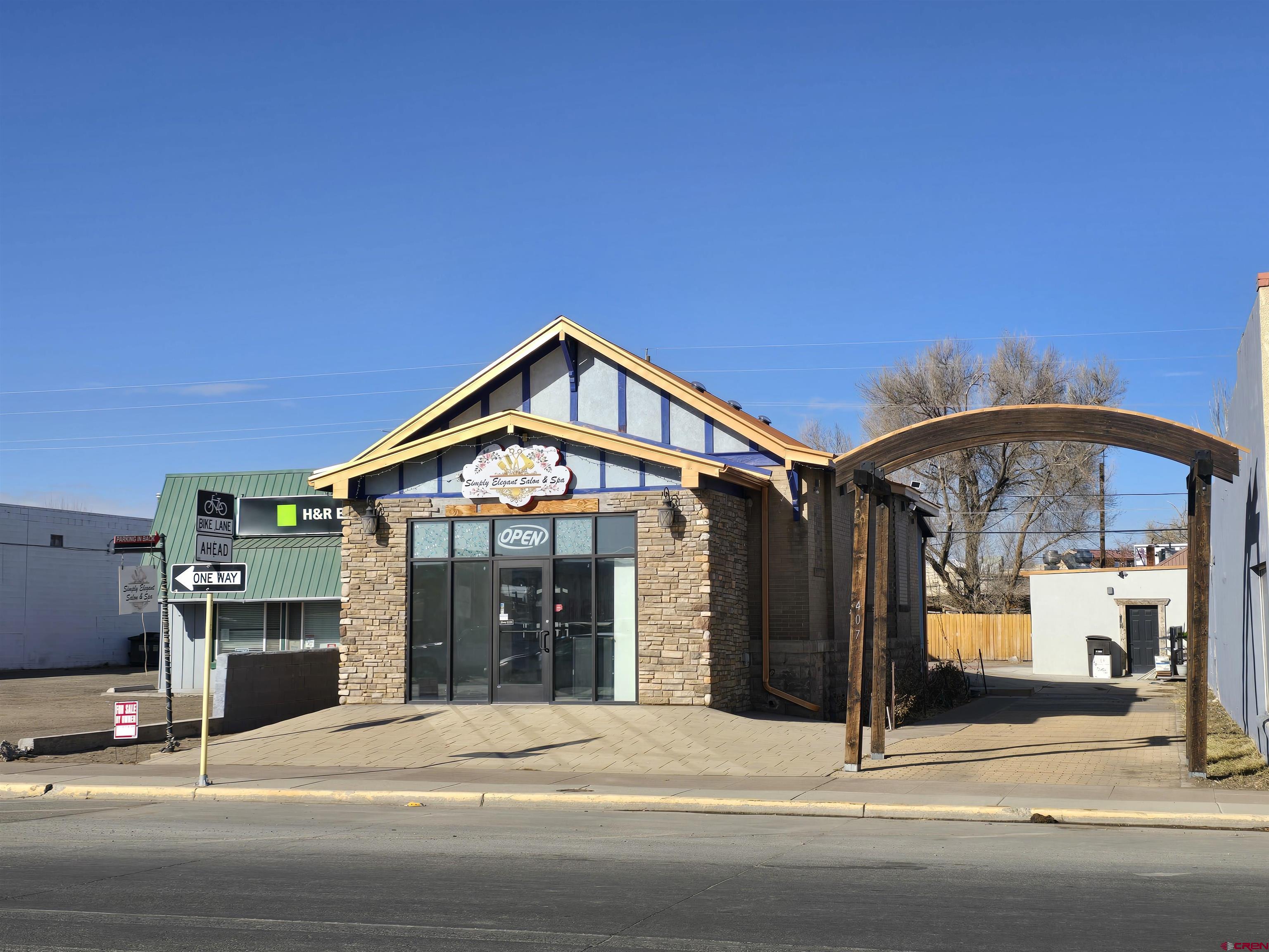 a view of a building with a street