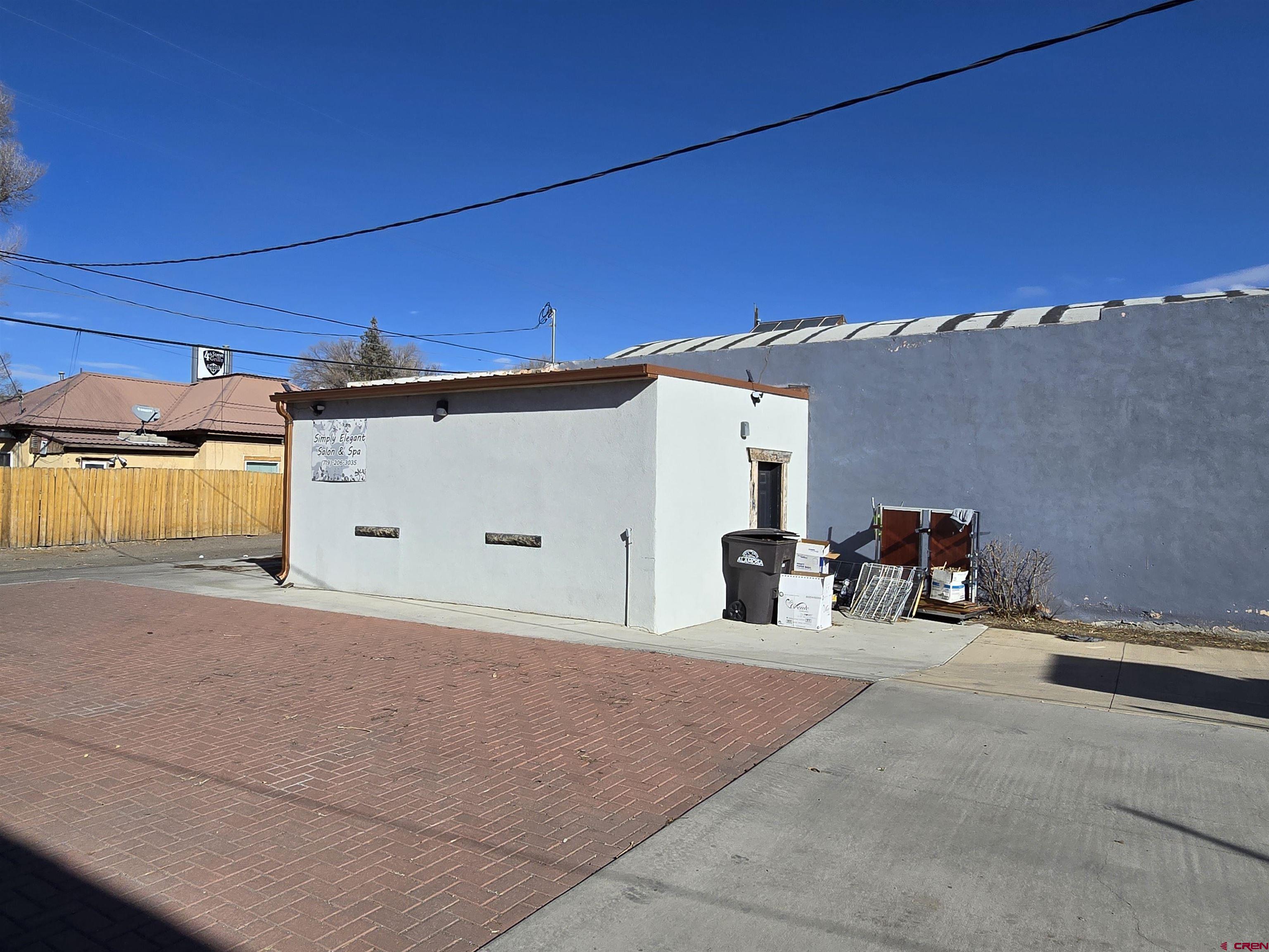407 Main Street Alamosa, CO 81101 - Photo 13 of 13 a view of a backyard