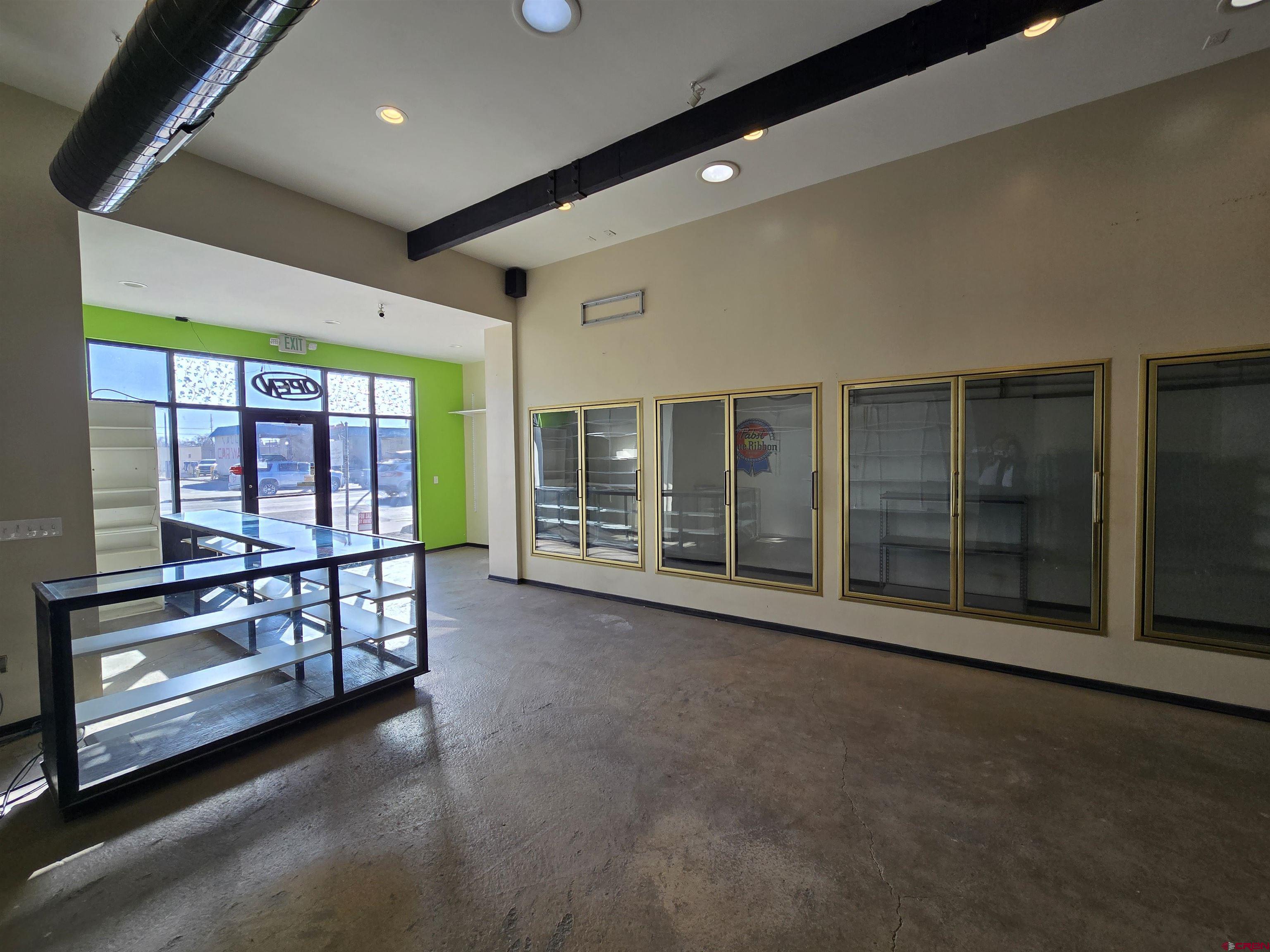 407 Main Street Alamosa, CO 81101 - Photo 3 of 13 a view of a room with gym equipment