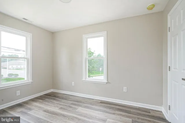 an empty room with window