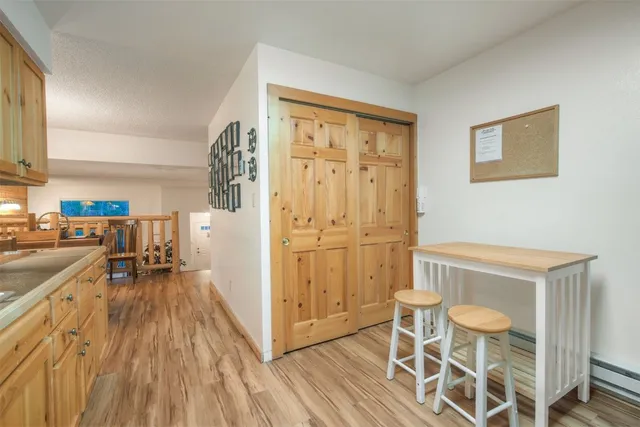 a view of a kitchen from the hallway
