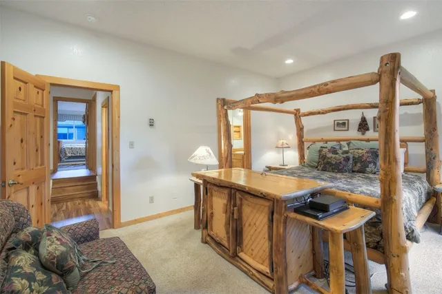 a room with a table and chairs