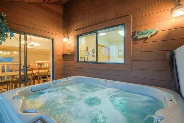 a view of a bedroom with a large window