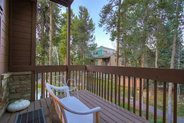 a view of a two chairs in the deck