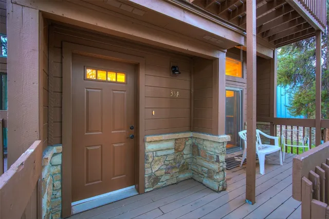 a view of wooden door and wooden floor