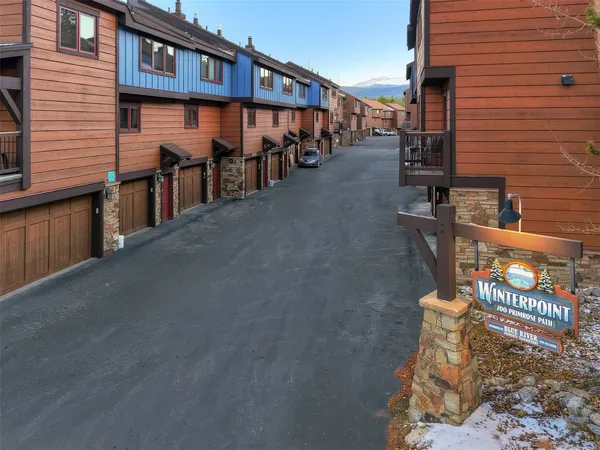 an aerial view of residential houses and outdoor space