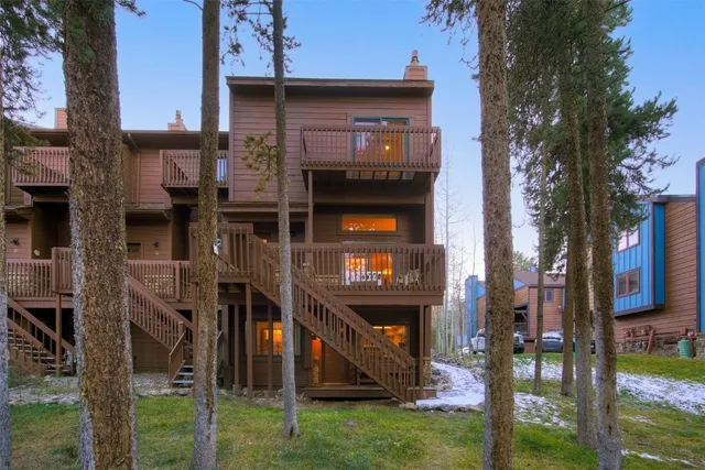 a view of a street with stores