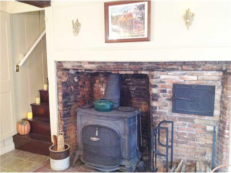 180 Windham Center Road Windham, ME 04062 - Photo 11 of 28 Kitchen. fireplace/woodstove in the...