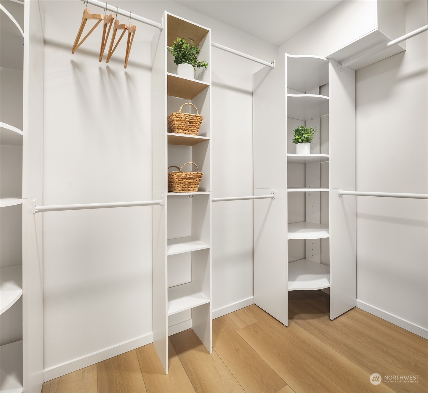 3304 49th Avenue Southwest Seattle, WA 98116 - Photo 14 of 34 a view of walk in closet with empty racks