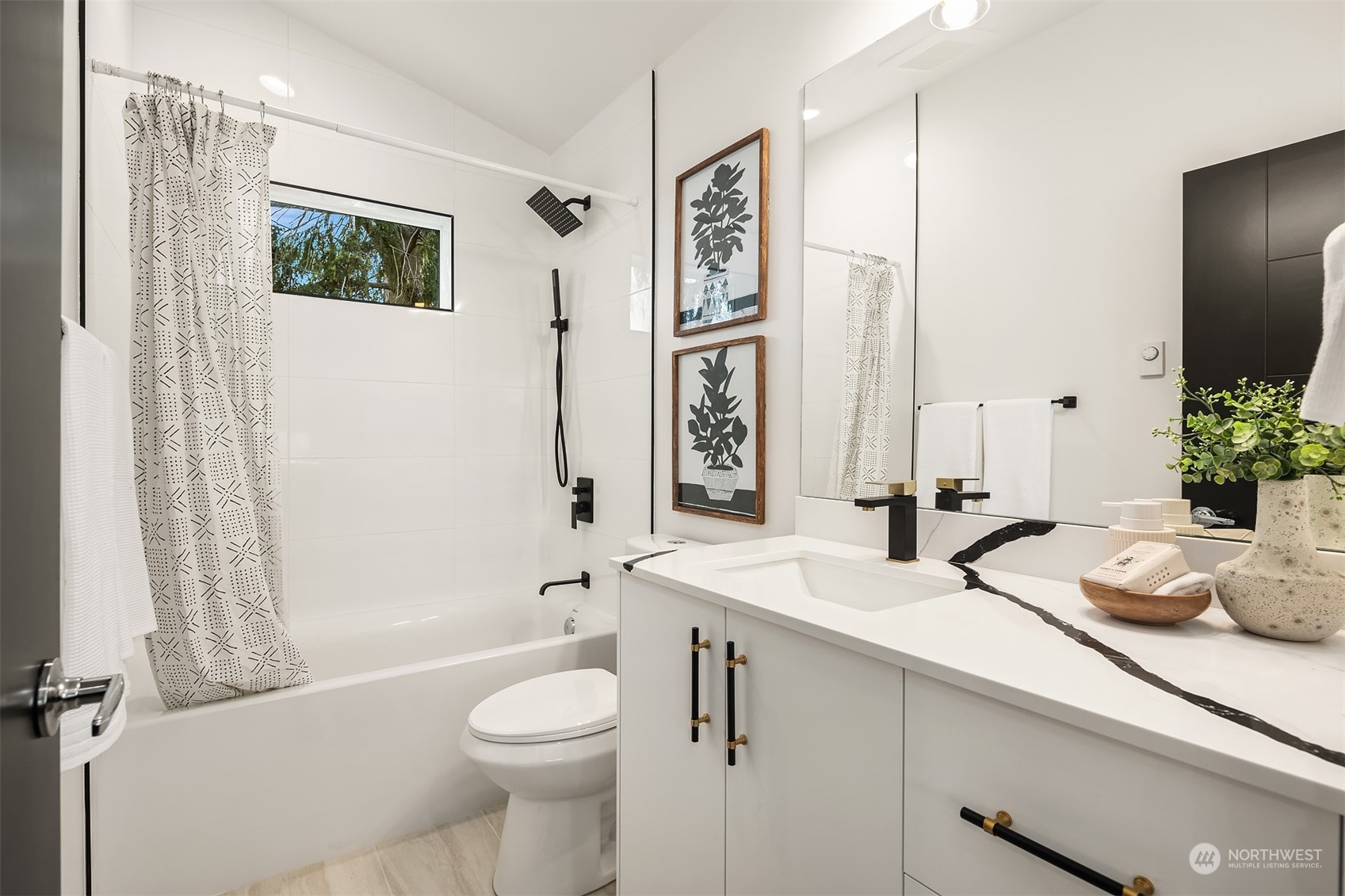 3304 49th Avenue Southwest Seattle, WA 98116 - Photo 22 of 34 a bathroom with a granite countertop sink toilet and shower