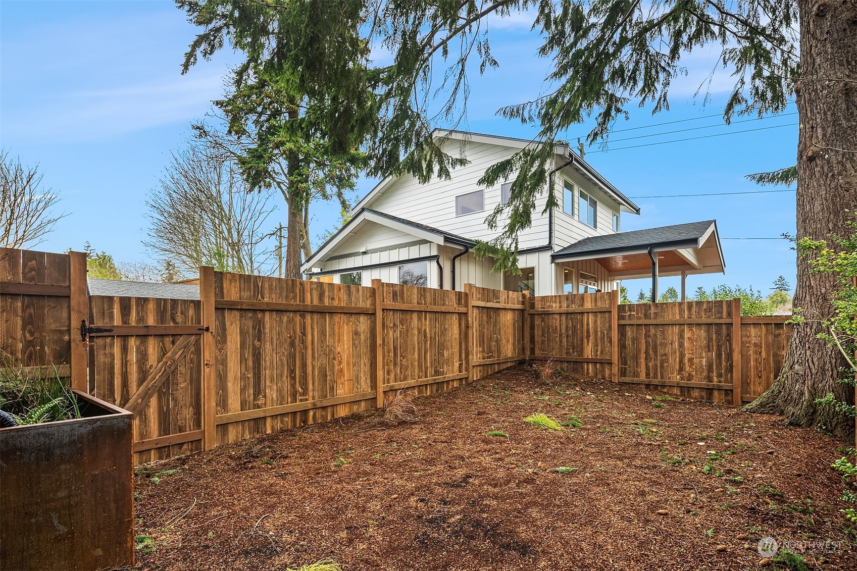 3304 49th Avenue Southwest Seattle, WA 98116 - Photo 29 of 34 a view of a backyard