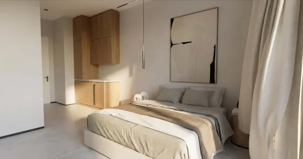 a bedroom with a bed and a wall painting