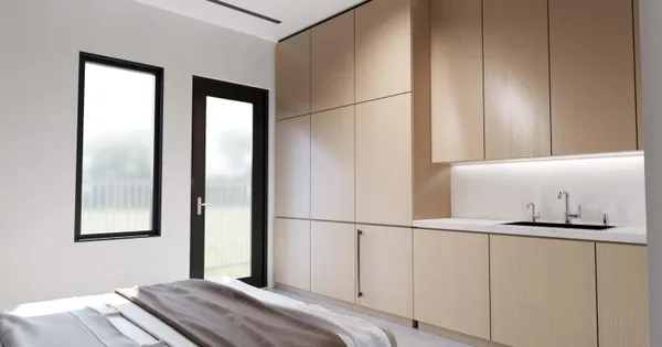 a bedroom with a bed and a window